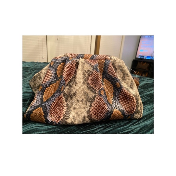 New York & Company Handbags - Faux leather snake print clutch